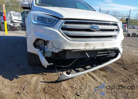 2017 Ford Escape Titanium z USA, uszkodzony, nr VIN 1FMCU9J91HUE31420